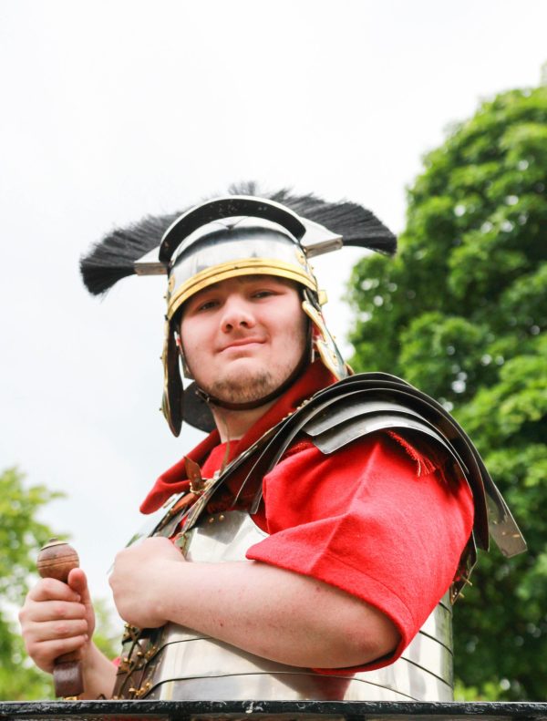 A man dressed as a Roman soldier.