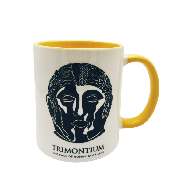 face of Roman Scotland coffee mug, yellow handle, white mug with yellow interior