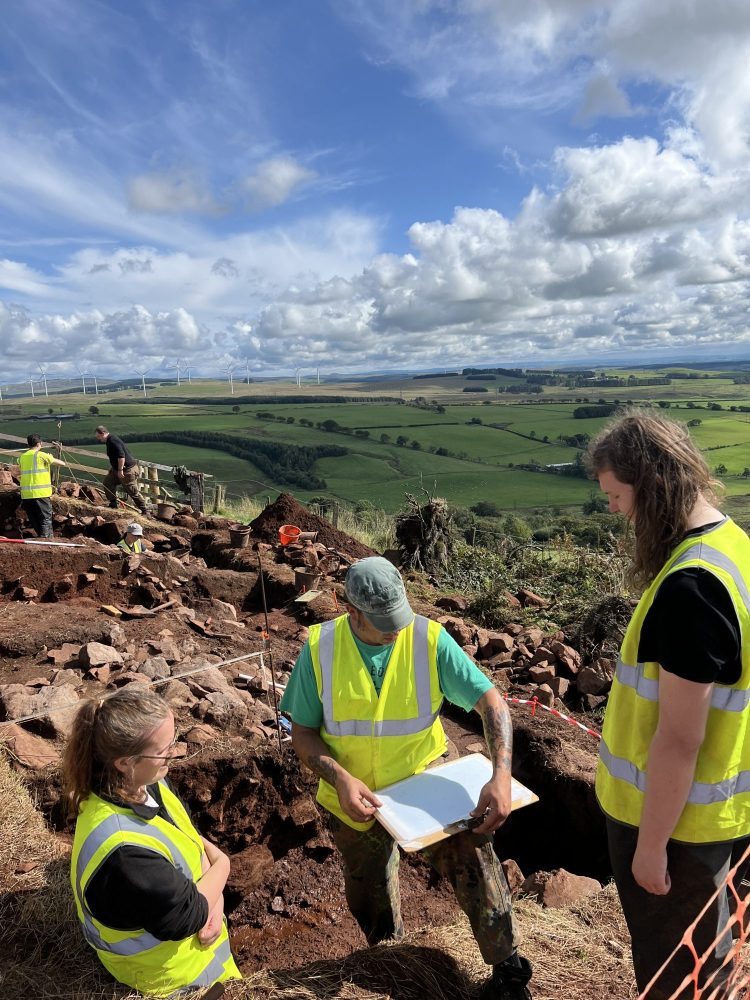 Archaeologists excavating Burnswark Hill
